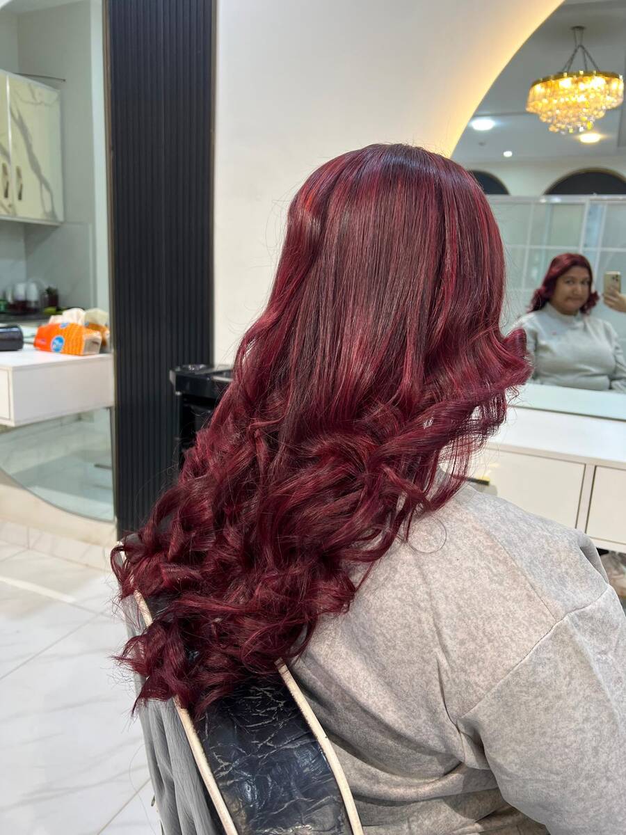 Beautiful Burgundy Hair Color by Sana Qureshi Studio